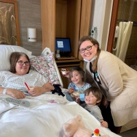 jeanie with family in hospital room