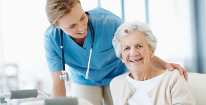 nurse and patient smiling