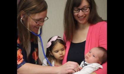 mother with kids and doctor